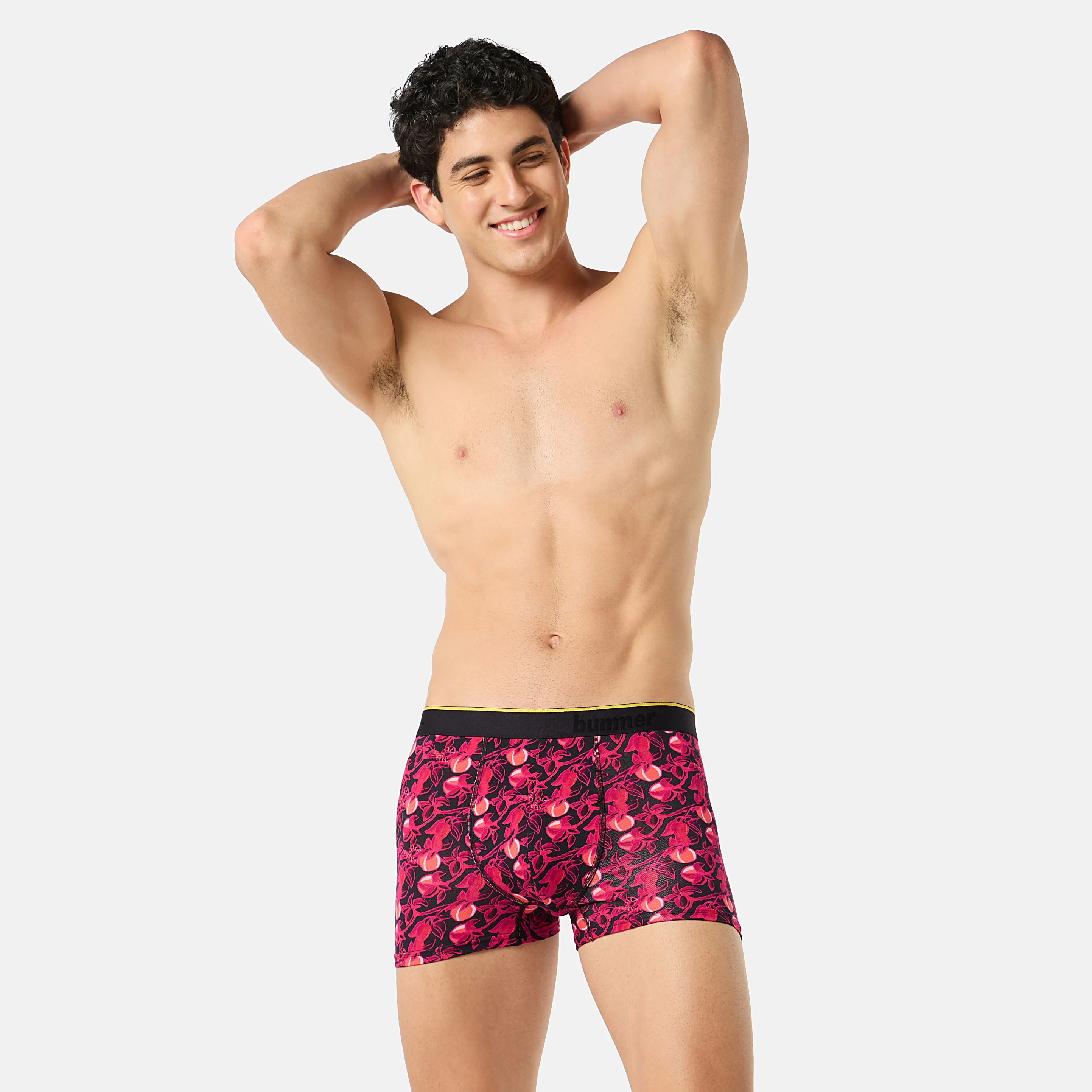 Model wearing Bummer Garden of Tease floral trunks